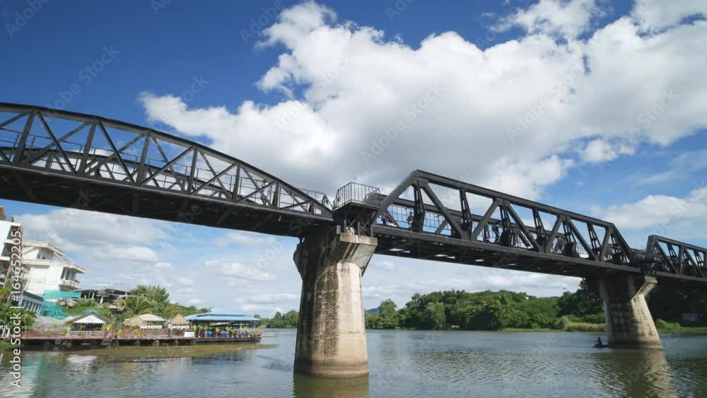Tourists on the Bridge River Kwai in Kanchanaburi, Thailand Tourists on the Bridge River Kwai in Kanchanaburi, Thailand