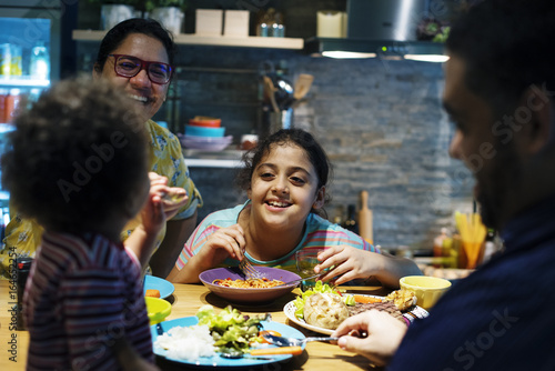 Brazilian family eating dinner together