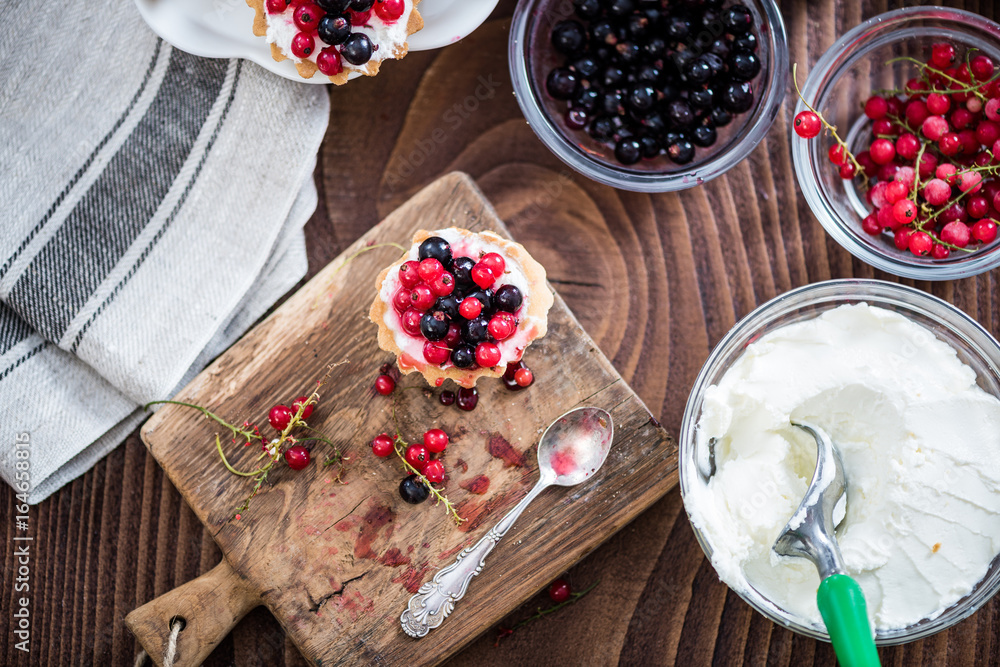 Homemade currant tart pie on wooden table