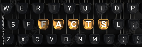 Typewriter with facts letters on buttons