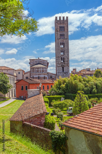 The old Italian town of Lucca. City landscape. In the background is the Basilica of San Frediano.