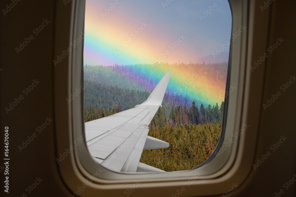 View from airplane window on rainbow View from airplane window on rainbow