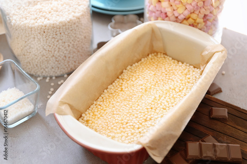 Baking dish with delicious rice dessert on table