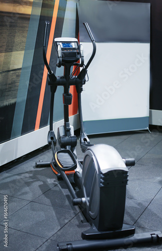 Modern stationary bicycle in store