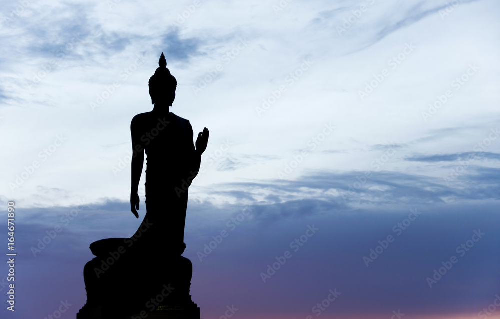 Silhouette of buddha statue