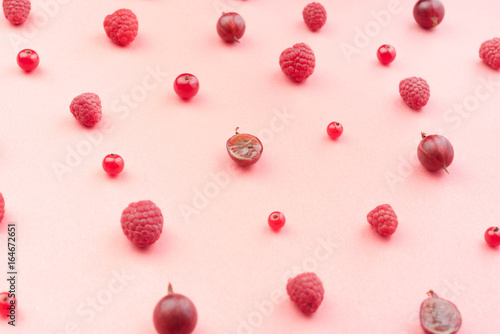 Berries isolated over pink background table.