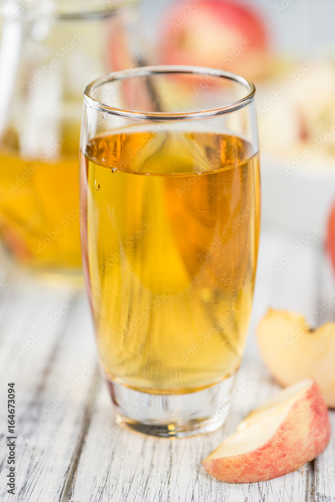 Apple Cider on wooden background (selective focus) Apple Cider on wooden background (selective focus)