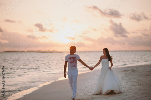 Wedding couple on the beach on the island