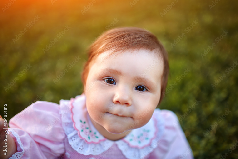 Sweet Beautiful little girl outdoors looking to the camera. Joyful, Happy, Excited. Closeup Portrait Sweet Beautiful little girl outdoors looking to the camera. Joyful, Happy, Excited. Closeup Portrait