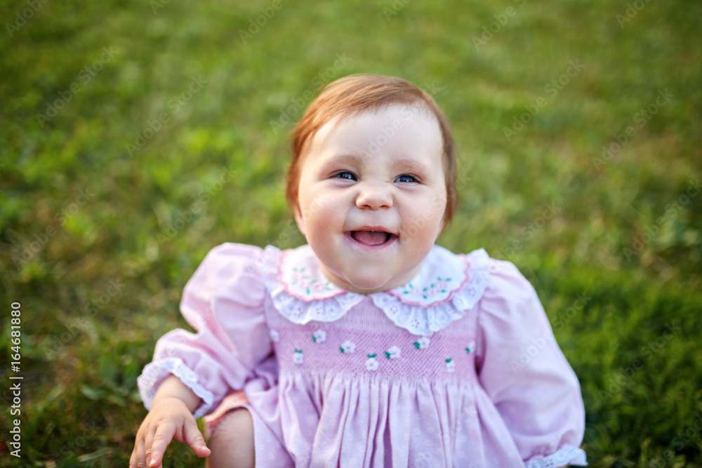 Sweet Beautiful little girl outdoors looking to the camera. Joyful, Happy, Excited. Closeup Portrait Sweet Beautiful little girl outdoors looking to the camera. Joyful, Happy, Excited. Closeup Portrait