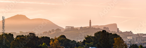 Edinburgh's Calton Hill at sunrise viewed from Inverleith. Scotland, United Kingdom 