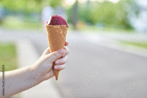 Baby hand with ice cream 