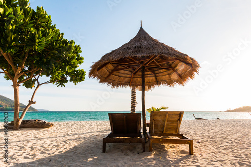 Relaxing  Deck Chairs on Tropical Beach
