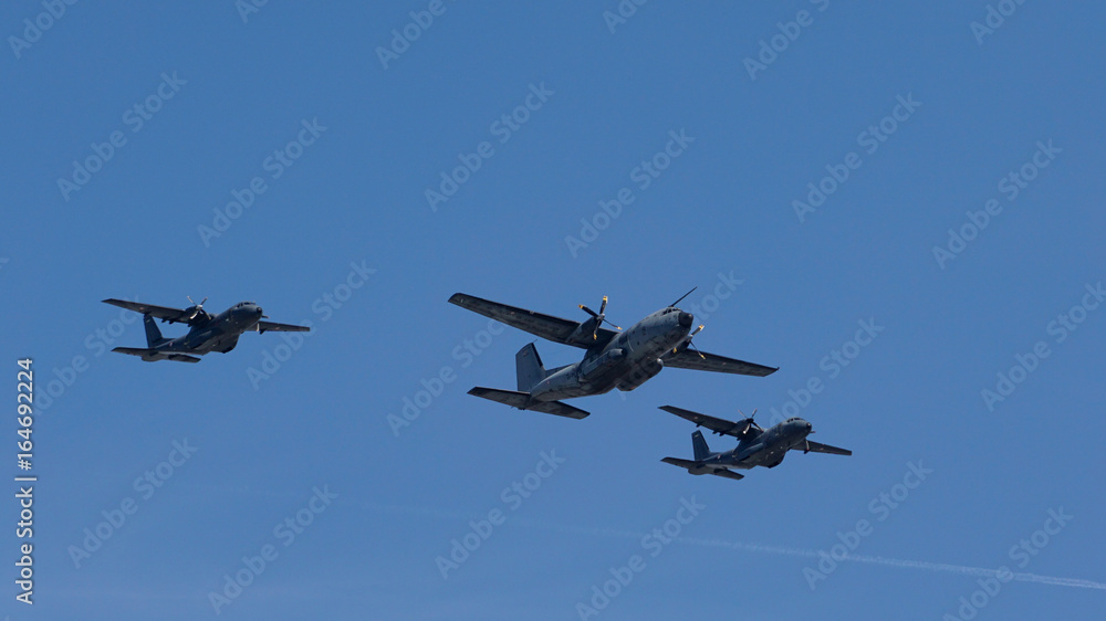 Military aircrafts in formation Military aircrafts in formation