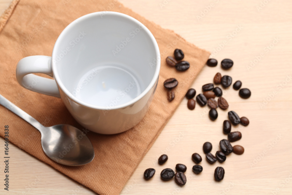 empty white coffee cup on wood background empty white coffee cup on wood background