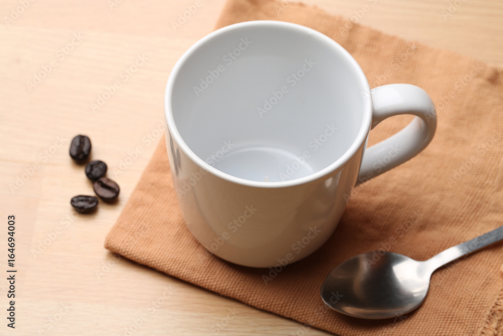 empty white coffee cup on wood background empty white coffee cup on wood background