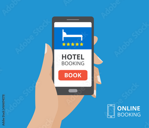 Design concept of hotel booking online. Hand holding smartphone with book button and bed icon on screen