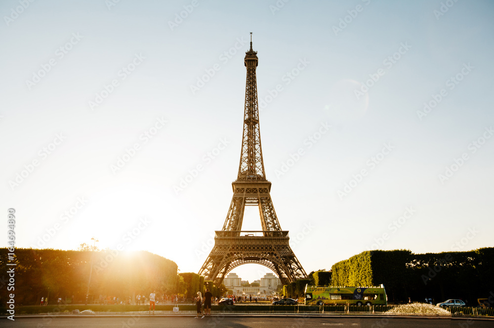 Paris, France - June 19, 2017: View of Eiffel tower, view from Champ de Mars in the morning with a blue sky in a background