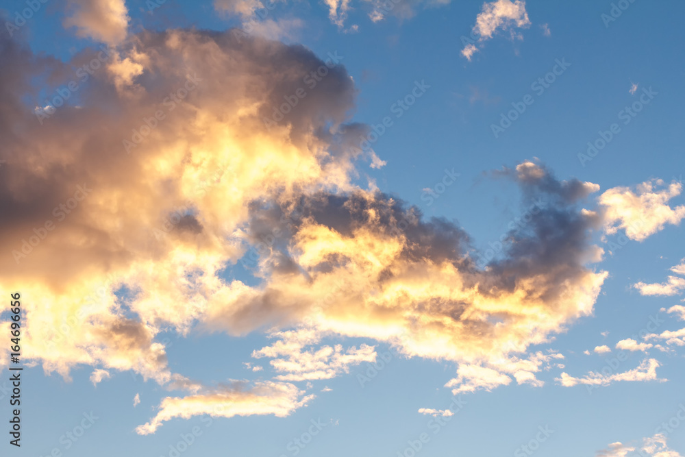 Blue sky background with white clouds, rain clouds in twilight on sunny summer or spring day. Blue sky background with white clouds, rain clouds in twilight on sunny summer or spring day.