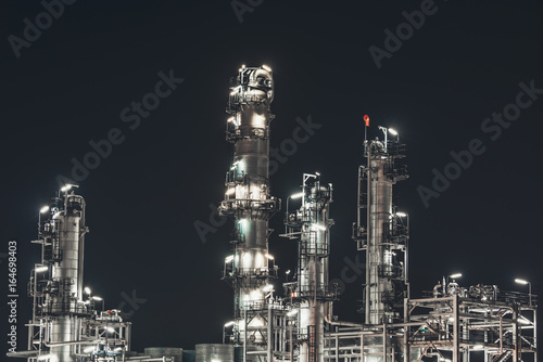 Industrial zone,The equipment of oil refining,Close-up of industrial pipelines of an oil-refinery plant,Detail of oil pipeline with valves in large oil refinery. © vacancylizm