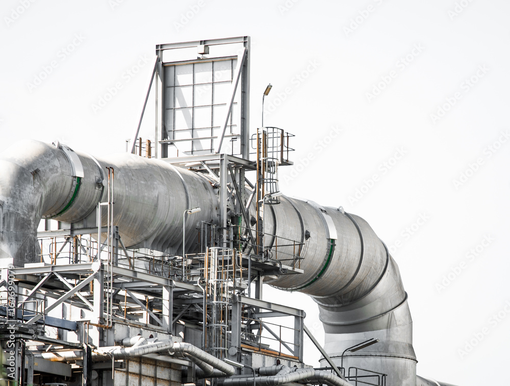 Industrial zone,The equipment of oil refining,Close-up of industrial pipelines of an oil-refinery plant,Detail of oil pipeline with valves in large oil refinery. Industrial zone,The equipment of oil refining,Close-up of industrial pipelines of an oil-refinery plant,Detail of oil pipeline with valves in large oil refinery.