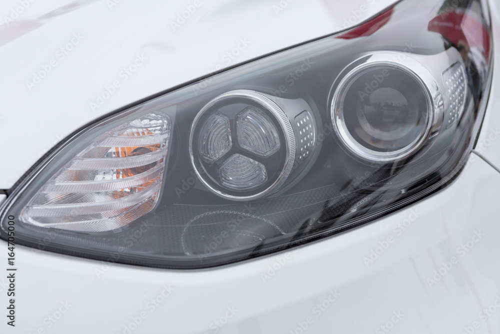 Headlight with lens of a modern car