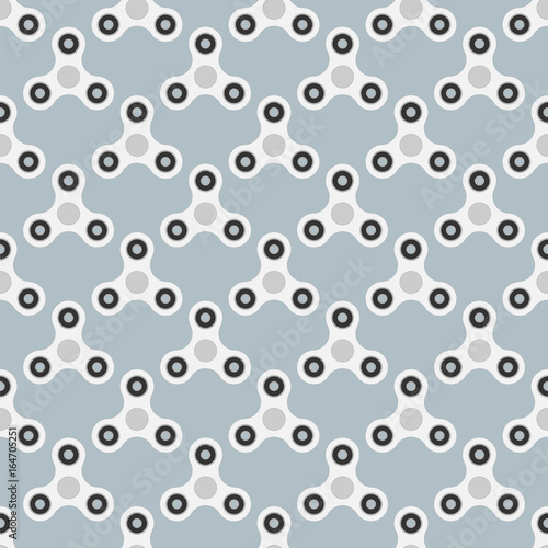 Seamless pattern from a spinner toy. Toy fidget to relieve stress. Vector illustration