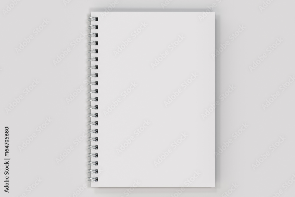 Closed notebook spiral bound on white background Closed notebook spiral bound on white background