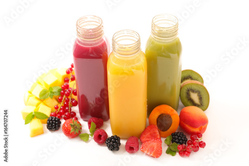 fruit juice on bottle isolated on white