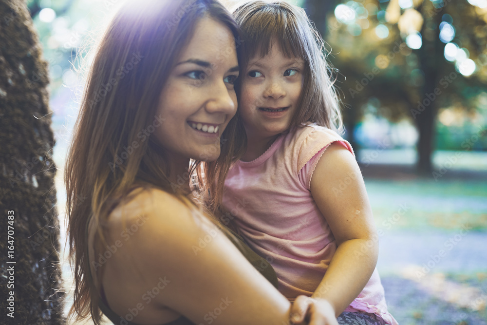 Naklejka premium Picture of mother and child with special needs