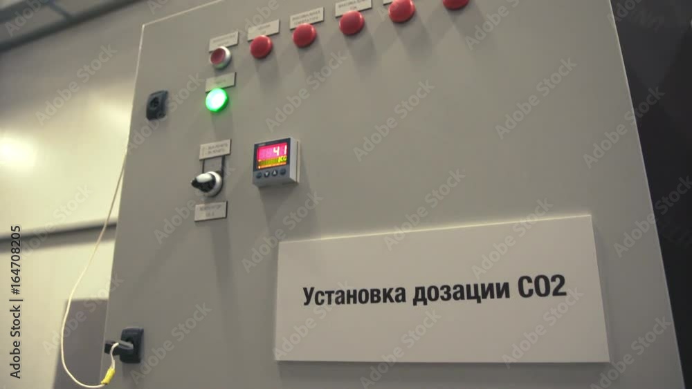 Automatic control panel with different buttons and lights. Remote ...