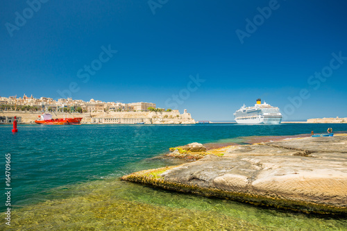 Cruise ship and Valletta harbor view from Birgu. Malta.