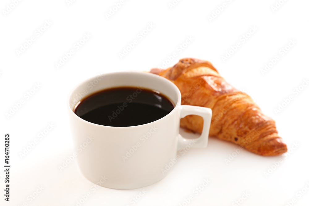 coffee cup and croissant coffee cup and croissant