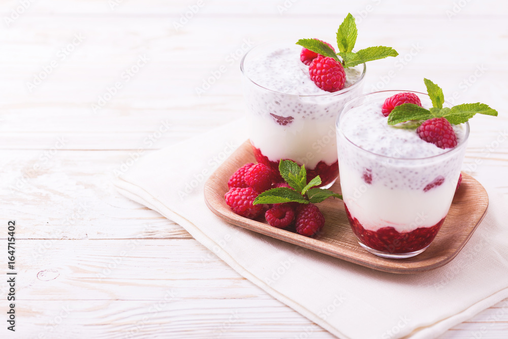 Raspberries chia pudding and fruit smoothie with mint