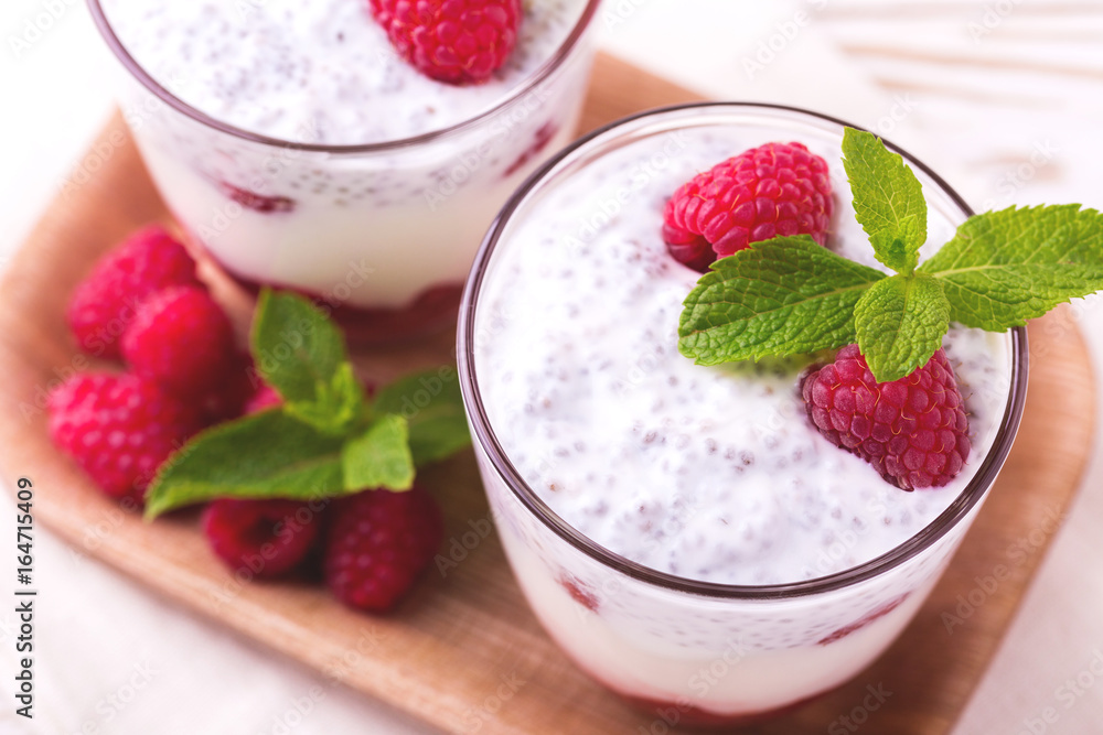 Raspberries chia pudding and fruit smoothie with mint Raspberries chia pudding and fruit smoothie with mint