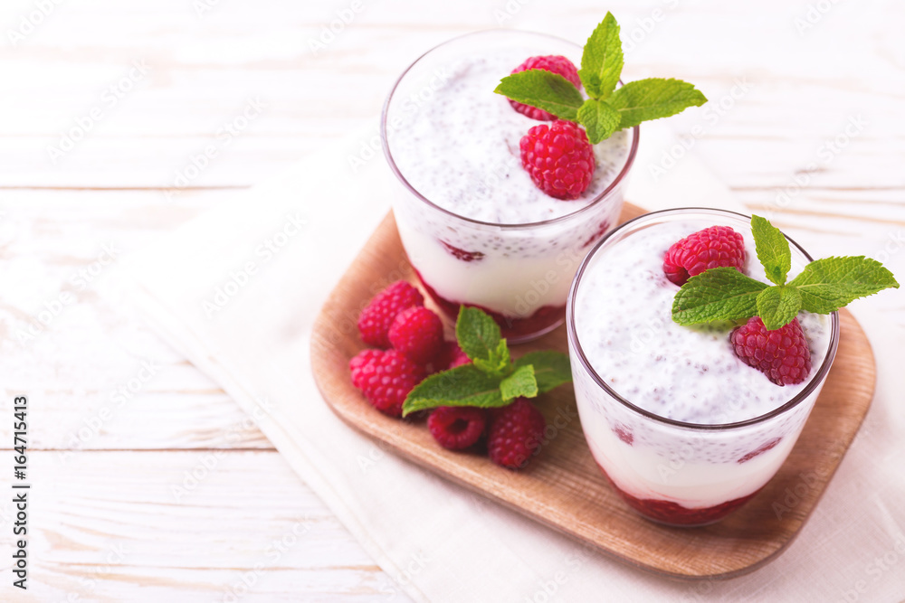 Raspberries chia pudding and fruit smoothie with mint Raspberries chia pudding and fruit smoothie with mint
