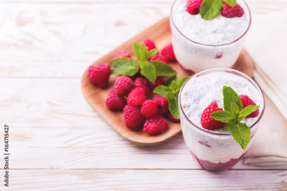 Raspberries chia pudding and fruit smoothie with mint Raspberries chia pudding and fruit smoothie with mint