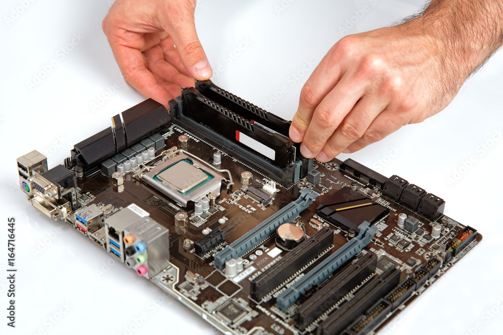 Modern computer mother board assembly, memory installation. Modern computer mother board assembly, memory installation.