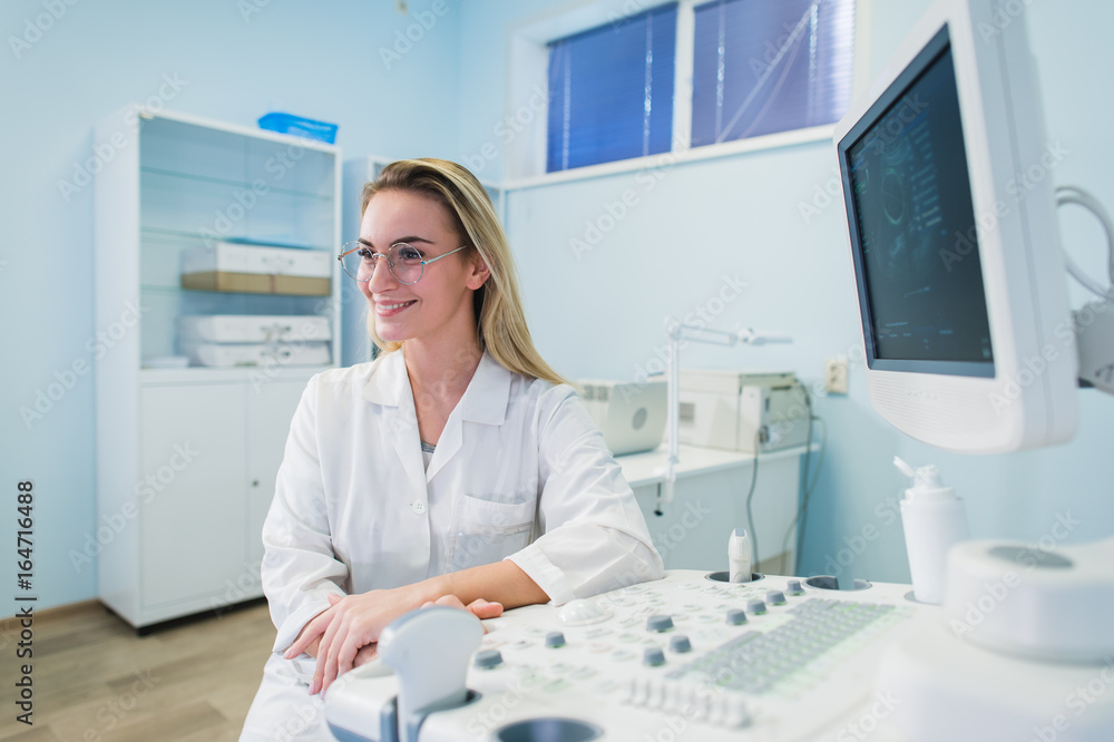 portrait of young female dentist in office portrait of young female dentist in office