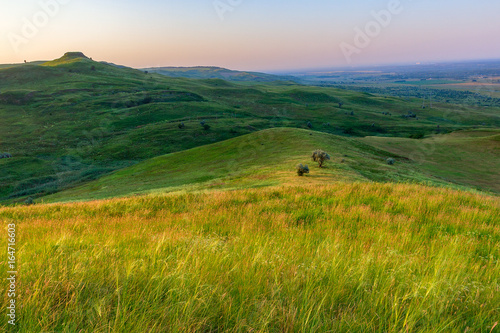 Landscape with hills of different lighting.