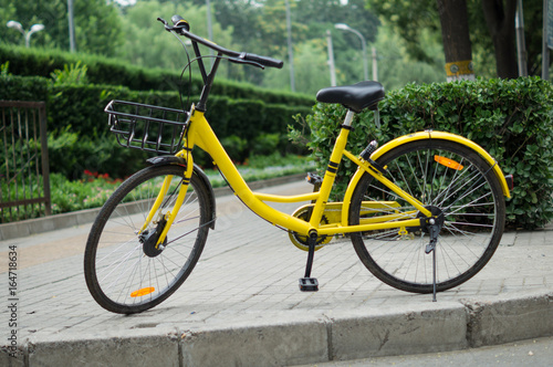 Yellow City Bicycle with Green Background