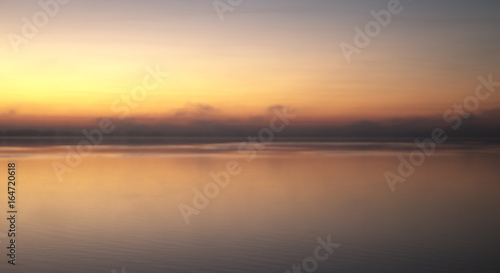 Sunrise with fog over lake © jacki319