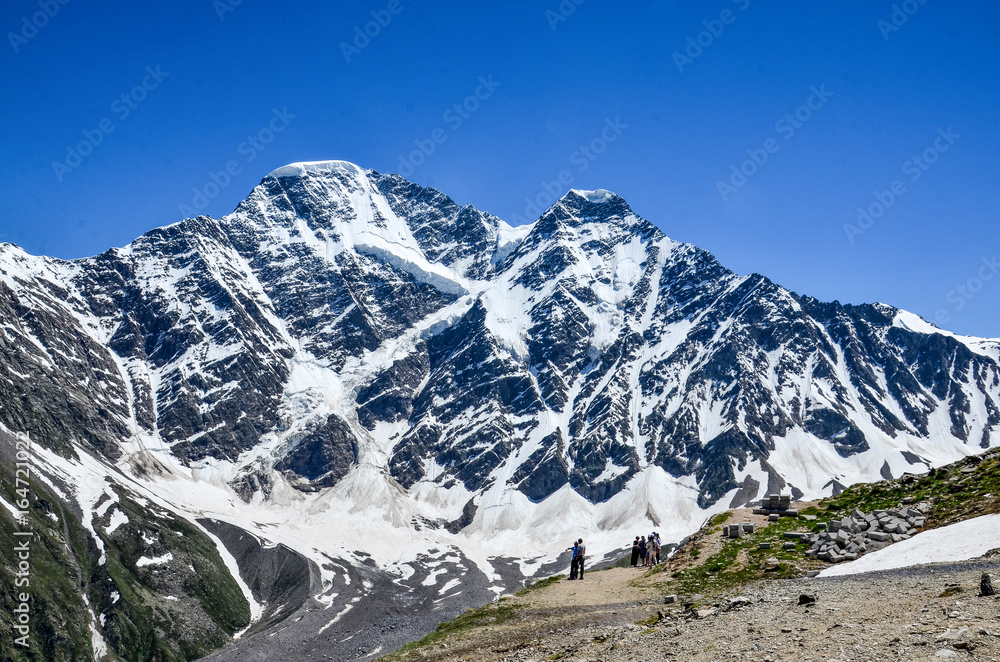 A beautiful mountain landscape. View of the Donguz-Orun mountain from Mount Cheget. Russia.