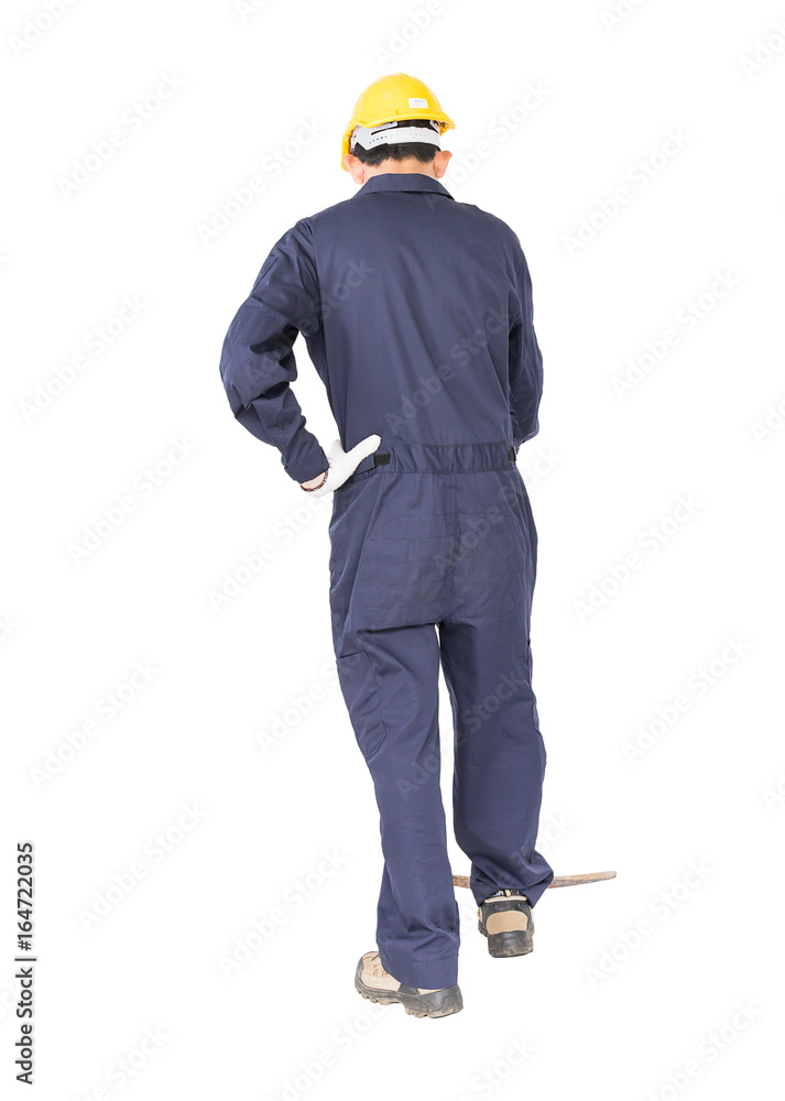 Man in uniform hold old pick mattock that is a mining device Man in uniform hold old pick mattock that is a mining device