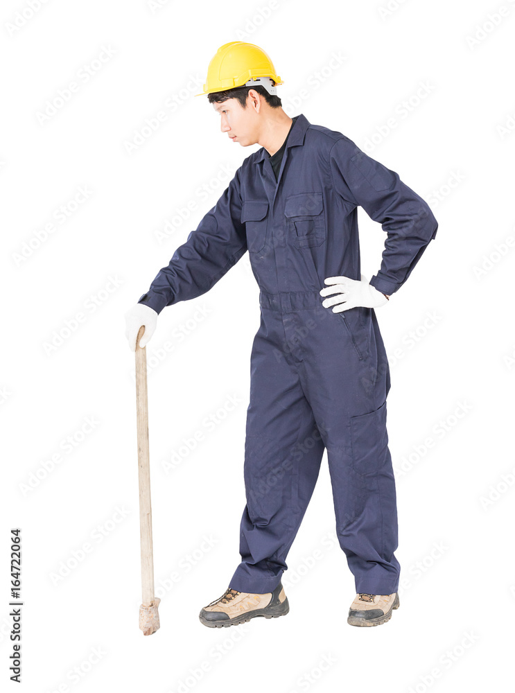 Man in uniform hold old pick mattock that is a mining device Man in uniform hold old pick mattock that is a mining device