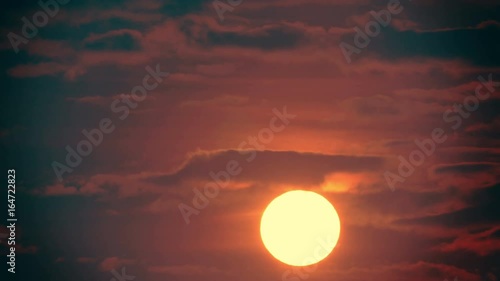 Early morning red dawn. Non-CG timelapse shot over the ocean.