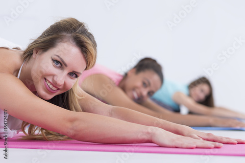 Young women during yoga class