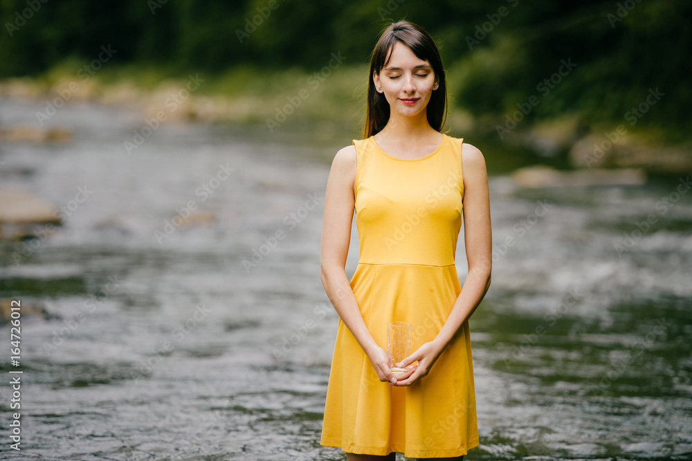Lonely young traveler tanned beautiful cutie tourist smiling girl with