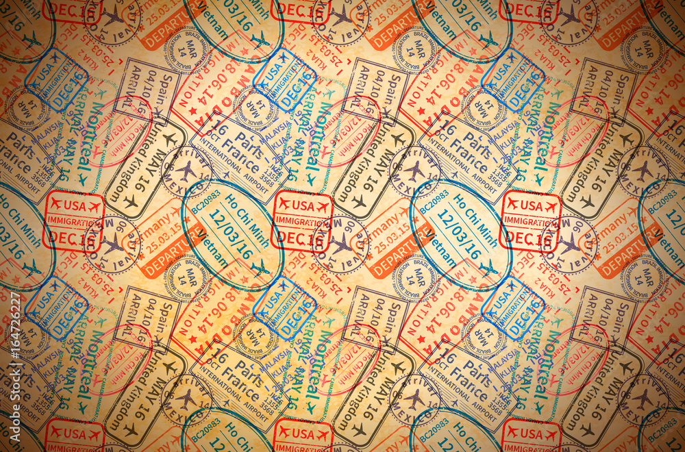 Colorful International travel visa rubber stamps imprints on old paper, horizontal vintage background