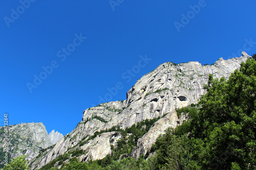 Granite rocks mountain walls in an alpine valley (Val di Mello batholith)